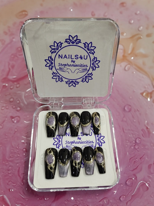 mmerse yourself in the world of opulence and sophistication as we delve into the exquisite art of creating "Dark Jewels" press-on nails. Each nail design is a masterpiece, meticulously crafted to adorn your fingertips with a touch of glamour and allure.