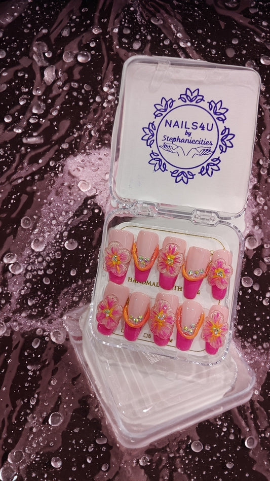 Elevate your style with our 3D Flower Power Press-On Nails. Featuring 3D flowers, these nails will give you an island feel perfect for the summery season. Experience the beauty of nature on your fingertips with these luxurious press-on nails.