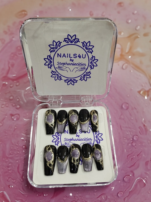 Immerse yourself in the world of opulence and sophistication as we delve into the exquisite art of creating "Dark Jewels" press-on nails. Each nail design is a masterpiece, meticulously crafted to adorn your fingertips with a touch of glamour and allure.
