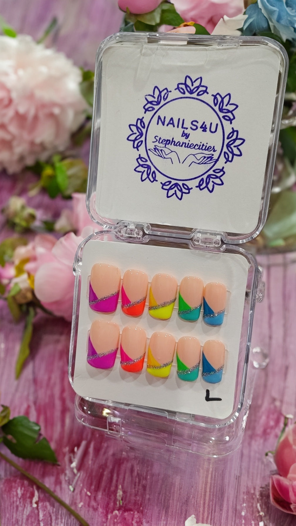 Illuminate your look with our Glow N Dark Rainbow Press-on Nails. These luminous nails feature a playful rainbow design, adding a touch of fun and playfulness to your style. Bring a frisky vibe to any occasion with these unique nails.